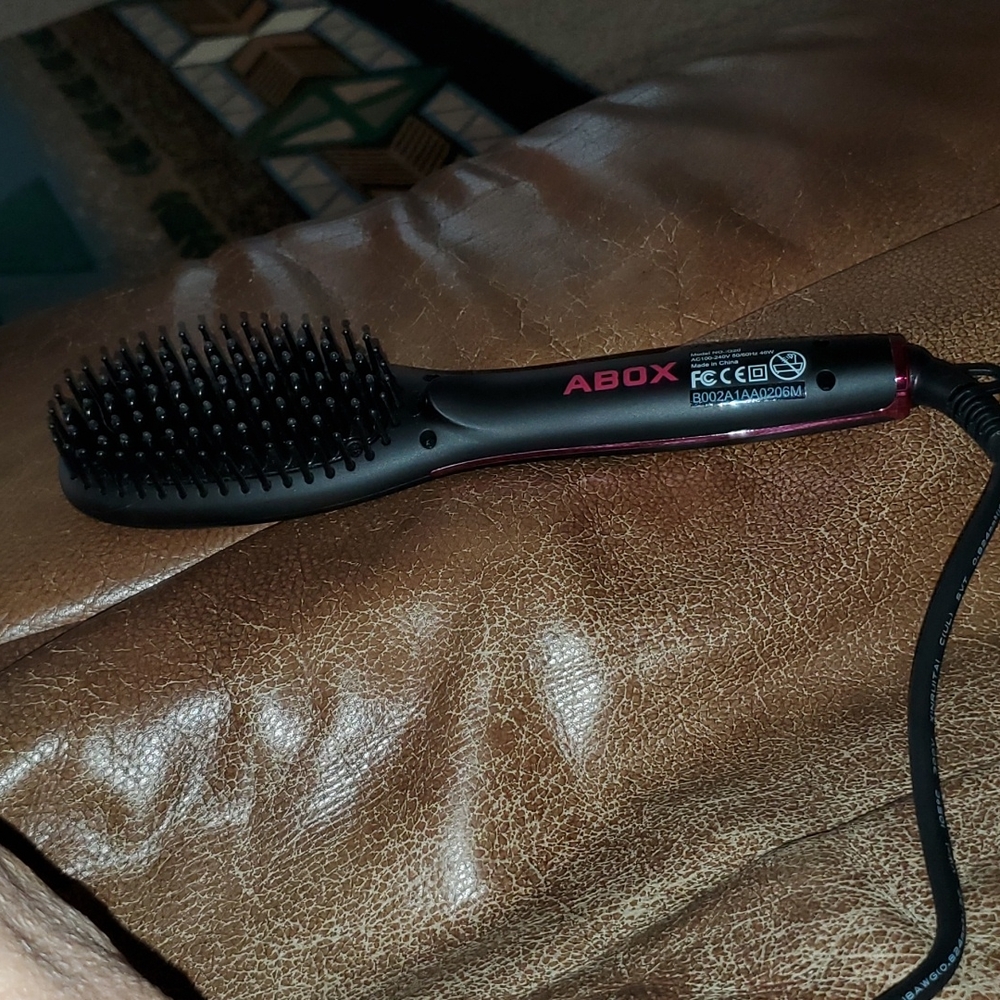 Abox hot hair brush with case a glove for heat protection.